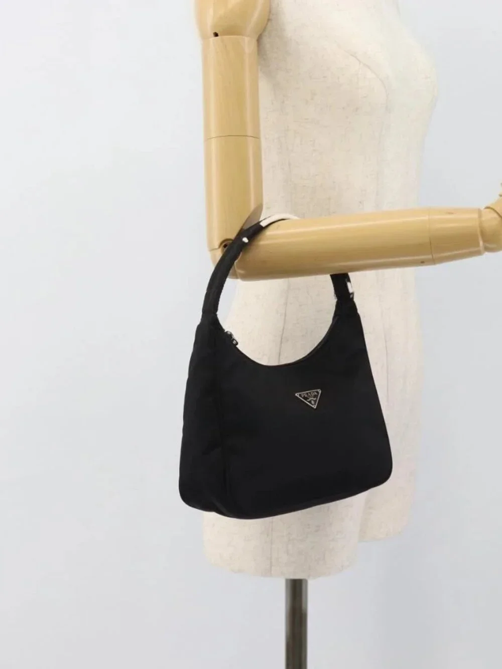 Prada brand	prada color	black
